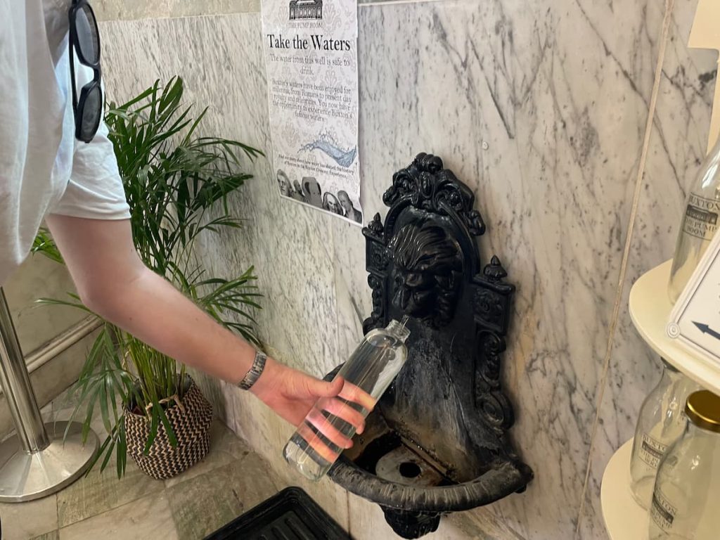 filling up a water bottle in the pumping station