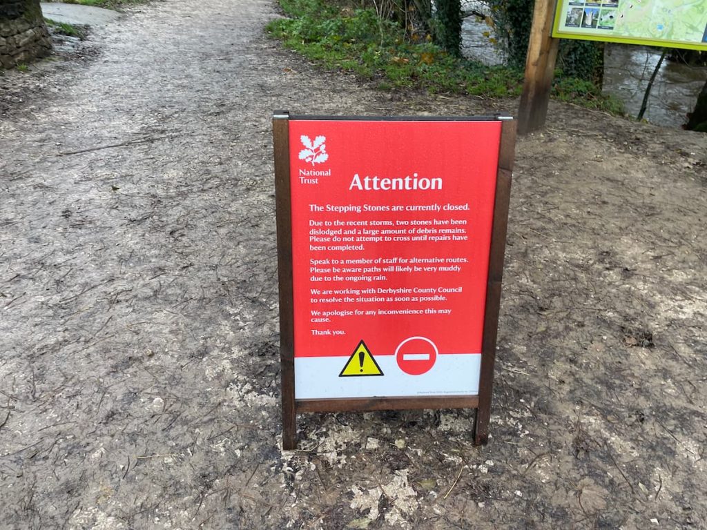 warning sign of high water levels at the dovestone stepping stones