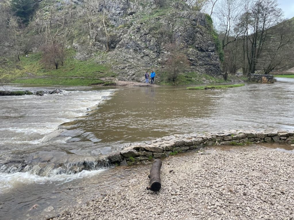 flooded dovedale stepping stones side view