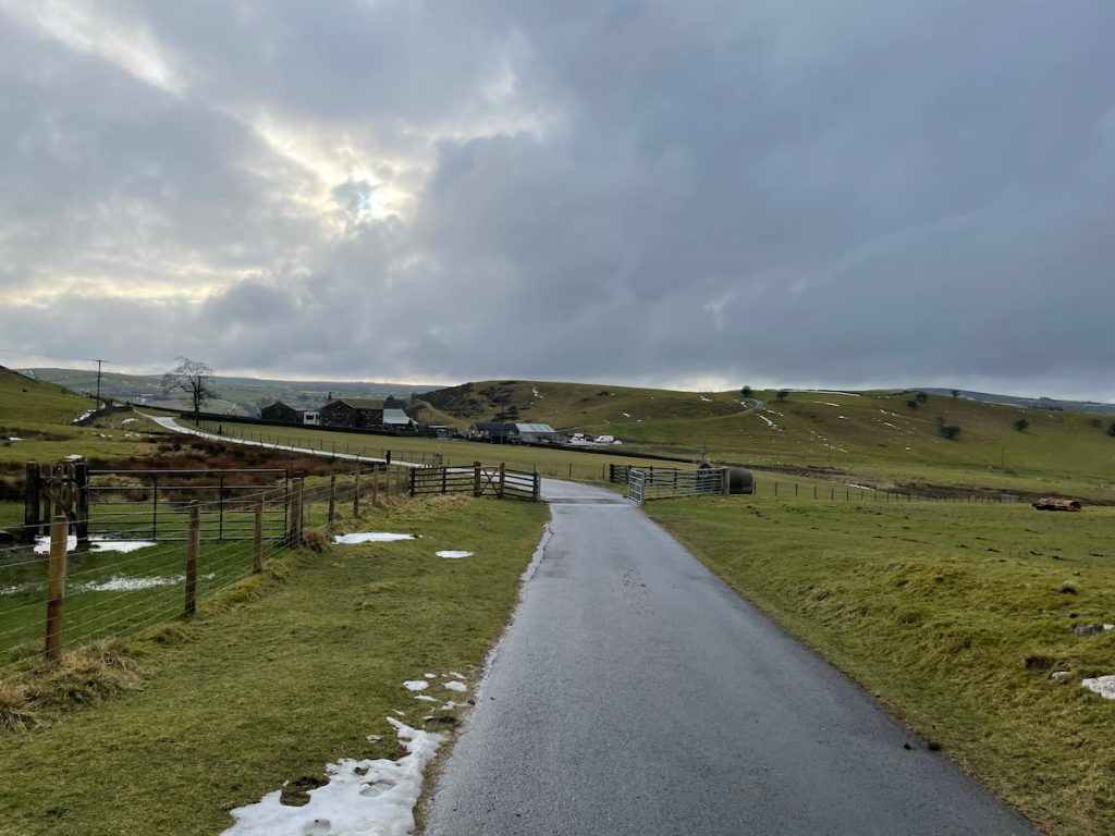 path down road overlooking booth farm