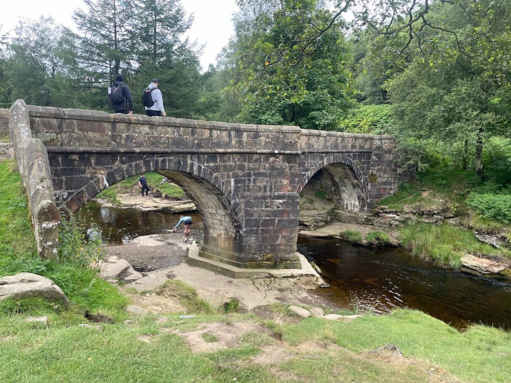 bridge at slippery stones popular for wild swimming