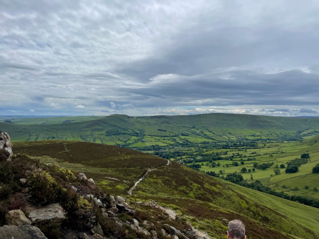 hilly outcrop as you head down from kinder scout into the valley - view of Mam Tor