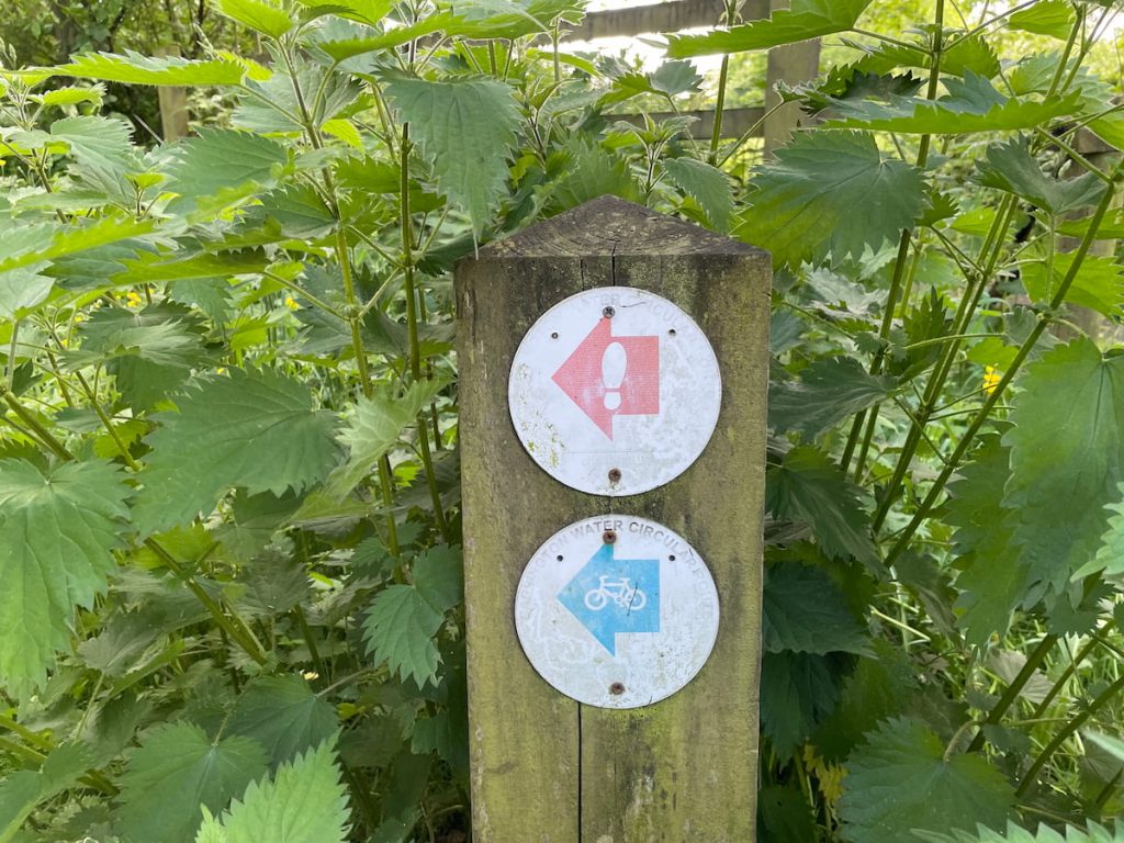 marked with a red footpath and blue arrow cycle path