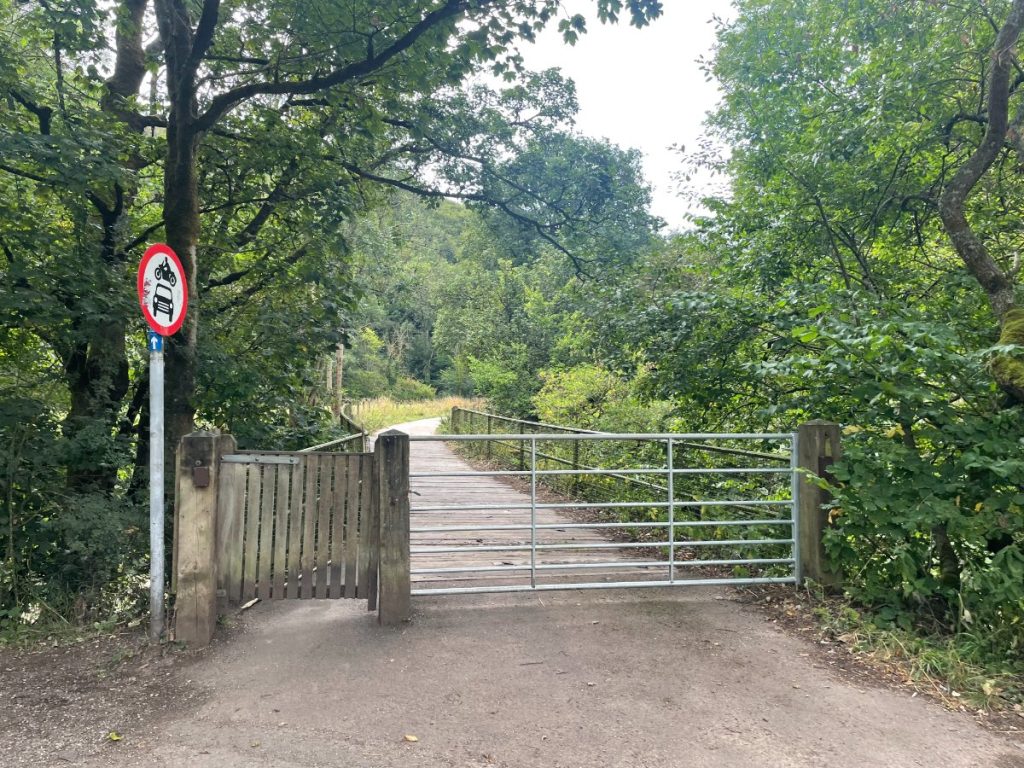 bridge over river mainfold leading onto main path